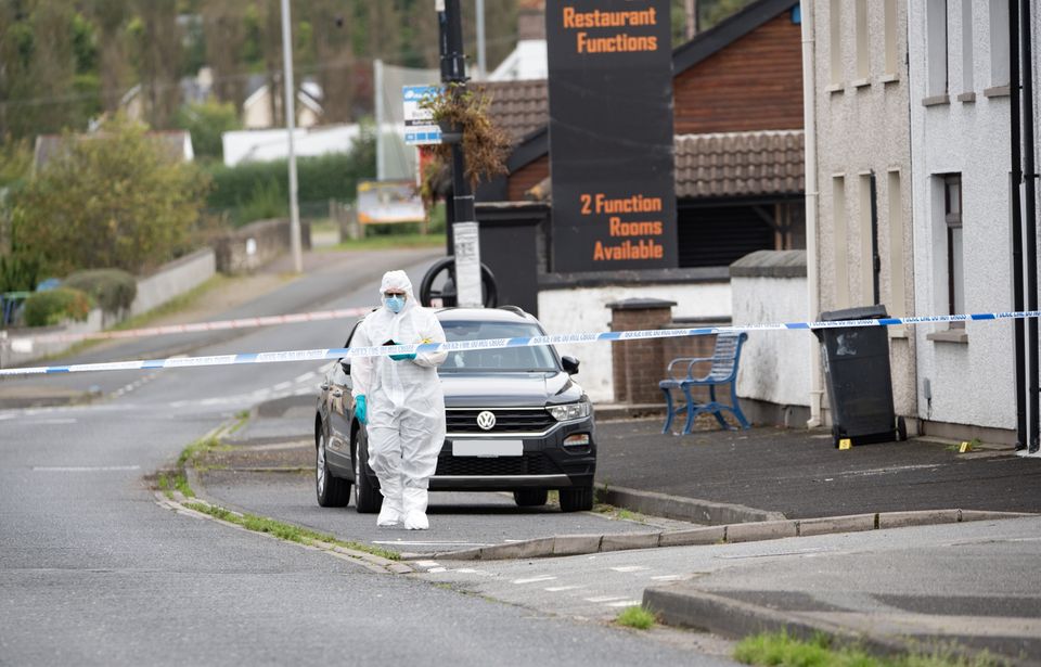 Detectives at the scene. Photo: Pacemaker