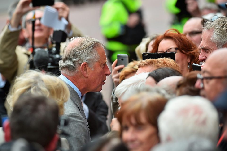 BELFAST, NORTHERN IRELAND - MAY 21:  Prince Charles, Prince of Wales greets well wishers as he visits St Patrick's Church on May 21, 2015 in Belfast, Northern Ireland. Prince Charles, Prince of Wales and Camilla, Duchess of Cornwall will attend a series of engagements in Northern Ireland following their two day visit in the Republic of Ireland.  (Photo by Jeff J Mitchell - WPA Pool/Getty Images)