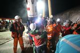 thumbnail: SAN JOSE MINE, CHILE - OCTOBER 12: (NO SALES, NO ARCHIVE) In this handout from the Chilean government, Mario Sepulveda, 39, is the second miner to exit the rescue capsule October 12, 2010 at the San Jose mine near Copiapo, Chile. The rescue operation has begun bringing up the 33 miners, 69 days after the August 5th collapse that trapped them half a mile underground. (Photo by Hugo Infante/Chilean Government via Getty Images)