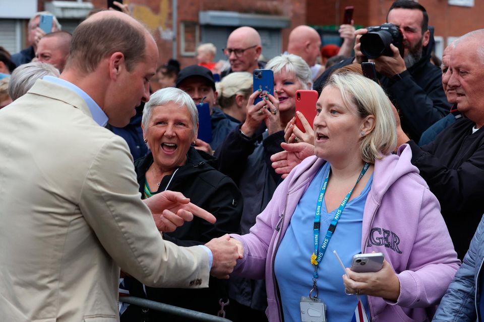 BELFAST, NORTHERN IRELAND - JUNE 27: Prince William, Prince of Wales meets members of the public after his visit to the East Belfast Mission at the Skainos Centre as part of his tour of the UK to launch a project aimed at ending homelessness on June 27, 2023 in Belfast, Northern Ireland.  William has set his sights on making rough sleeping, sofa surfing and other forms of temporary accommodation a thing of the past with his initiative called Homewards. The five-year project will initially focus on six locations, to be announced during Monday and Tuesday, where local businesses, organisations and individuals will be encouraged to join forces and develop "bespoke" action plans to tackle homelessness with up to £500,000 in funding. (Photo by Liam McBurney - Pool/Getty Images)