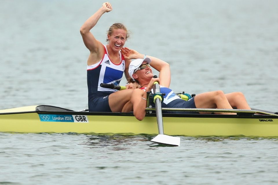 WINDSOR, ENGLAND - AUGUST 01:  (L-R) Heather Stanning and Helen Glover celebrate after winning gold in the Women's Pair Final during the Men's Single Sculls on Day 5 of the London 2012 Olympic Games at Eton Dorney on August 1, 2012 in Windsor, England.  (Photo by Quinn Rooney/Getty Images)