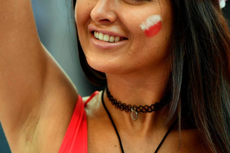 The beautiful game - football fans from around the world -   A Poland supporter gestures prior to the Euro 2016 quarter-final football match between Poland and Portugal at the Stade Velodrome in Marseille on June 30, 2016.