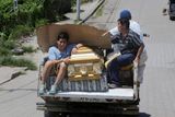 thumbnail: People carry an empty coffin on a pick up truck as they drive to collect the body of an earthquake victim in Pedernales, Ecuador, Sunday, April 17, 2016. Rescuers pulled survivors from the rubble Sunday after the strongest earthquake to hit Ecuador in decades flattened buildings and buckled highways along its Pacific coast on Saturday. The magnitude-7.8 quake killed hundreds of people. (AP Photo/Dolores Ochoa)