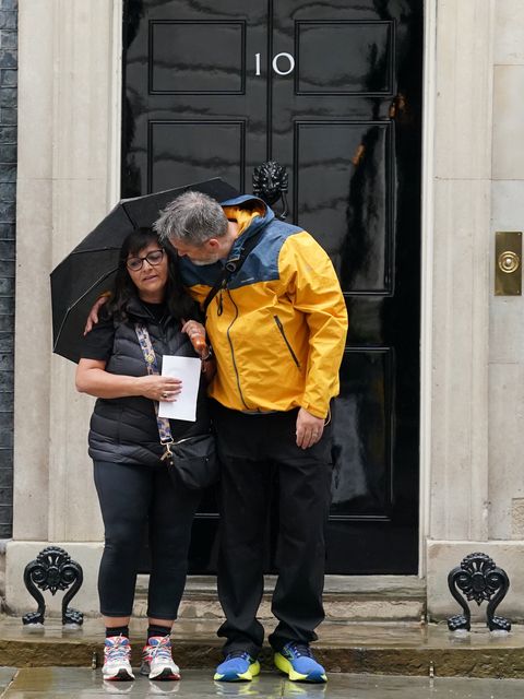 Figen Murray, mother of Martyn Hett, arrives in Downing Street with her husband Stuart to hand in a letter about Martyn’s Law to Number 10 (Stefan Rousseau/PA)