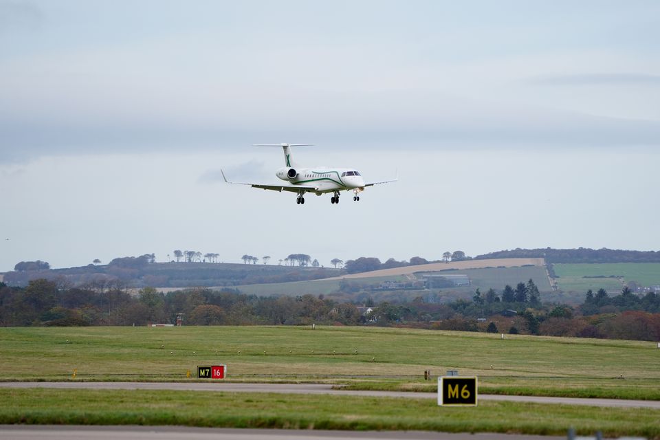 The plane landed just before 2pm on Friday (Jane Barlow/PA)