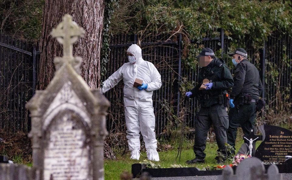 Police recover an item in the nearby St Patrick’s Cemetery after the murder of Karen Cummings in the Laurel Heights area of Banbridge on December 15th 2024 (Photo by Kevin Scott)