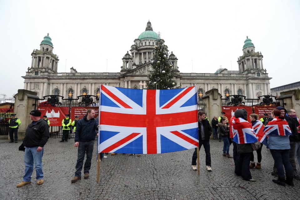 Loyalist protestors and PSNI officers pictured at Belfast City Hall on 22 December 2012