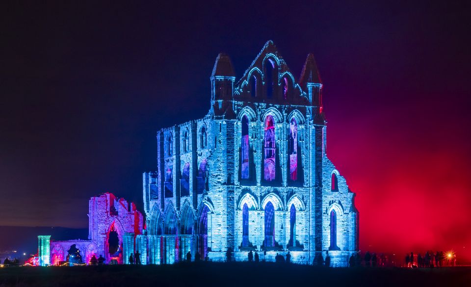 Lights illuminate the ruins of Whitby Abbey in North Yorkshire to mark Halloween (Danny Lawson/PA)