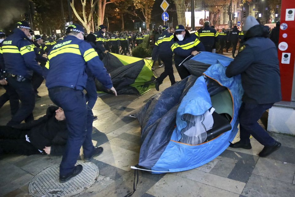 Police removed protesters’ tents from the camp in Tbilisi (Zurab Tsertsvadze/AP)