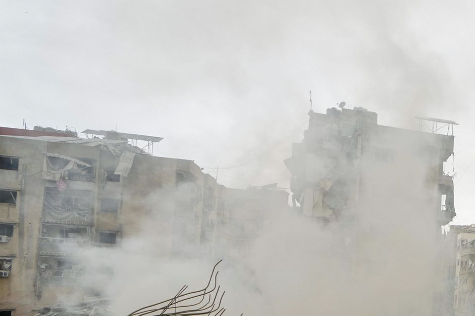 Smoke rises from destroyed buildings at the site of an Israeli air strike in Choueifat, south-east of Beirut (Bilal Hussein/AP)