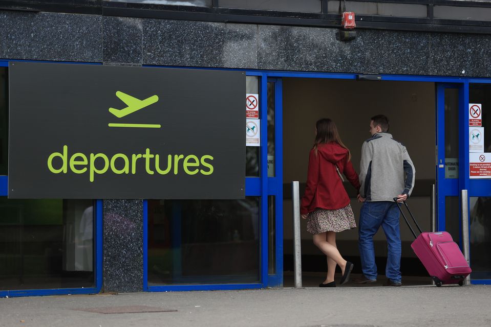 Passengers at Belfast International Airport (Liam McBurney/PA)