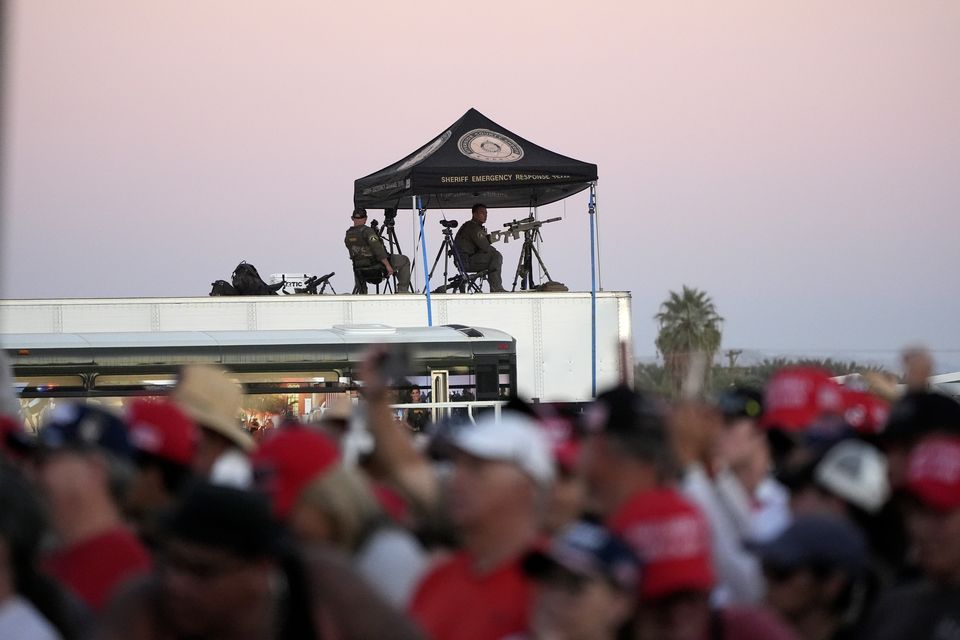 Snipers look over the scene as Donald Trump speaks (Alex Brandon/AP)