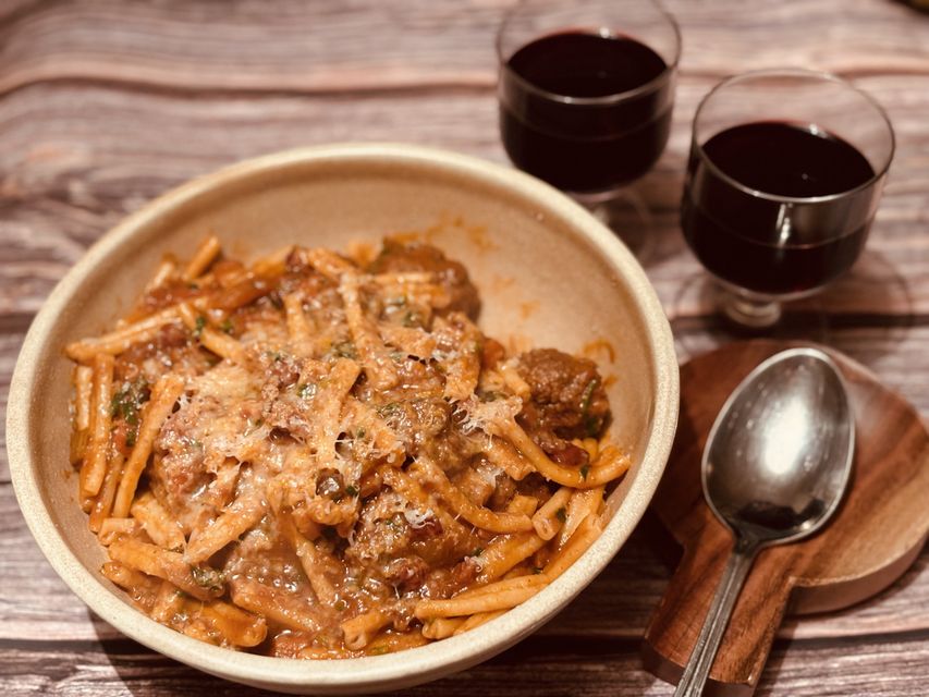 Meatballs with root vegetable ragu and pasta