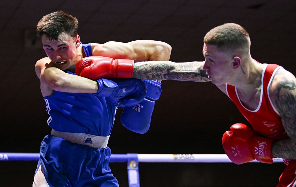 Luke Hall of Olympic BC Mullingar (left) in action against Joseph McArdle of Holy Trinity Belfast