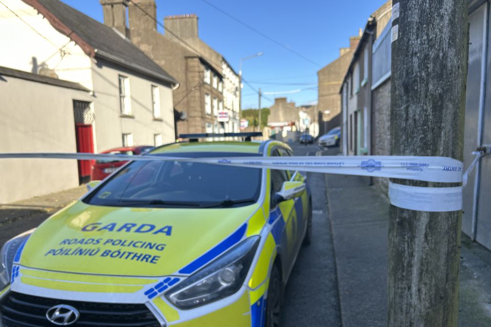 Garda at the scene in New Ross (Cillian Sherlock/PA)