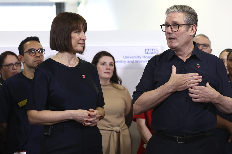 Prime Minister Sir Keir Starmer and Chancellor Rachel Reeves speak with members of staff at University Hospital Coventry & Warwickshire (Darren Staples/PA)