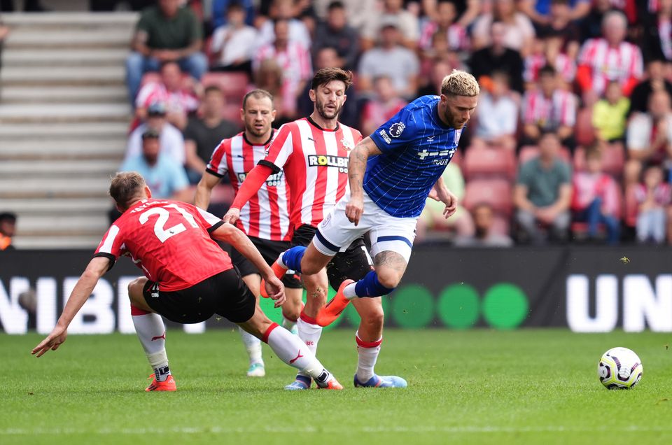 Burns wins a free-kick for Ipswich against Southampton (Adam Davy/PA)