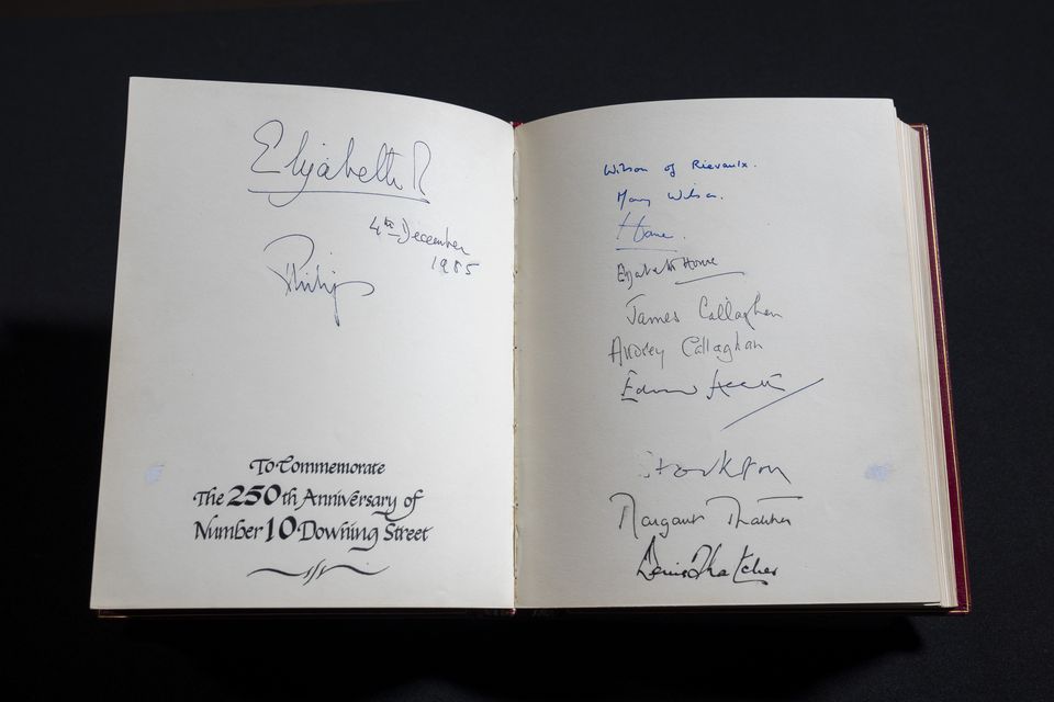 The pages marking the 250th anniversary of Downing Street with signatures of the Queen, Prince Philip, the Wilsons, the Humes, the Callaghans, Edward Heath, the Earl of Stockton, and Margaret and Denis Thatcher (Ben Whitley/PA)