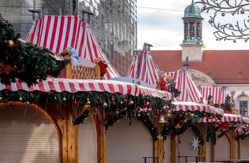 Police remain at the scene of the attack, and the Christmas market has been cordoned off (Michael Probst/AP)