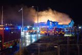 thumbnail: Firefighters battle the blaze at Carrickfergus Sailing Club last night