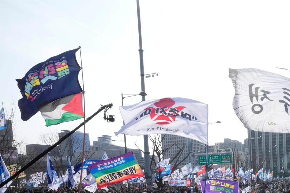 Protesters stage a rally calling for impeached South Korean President Yoon Suk Yeol to step down (Ahn Young-joon/AP)