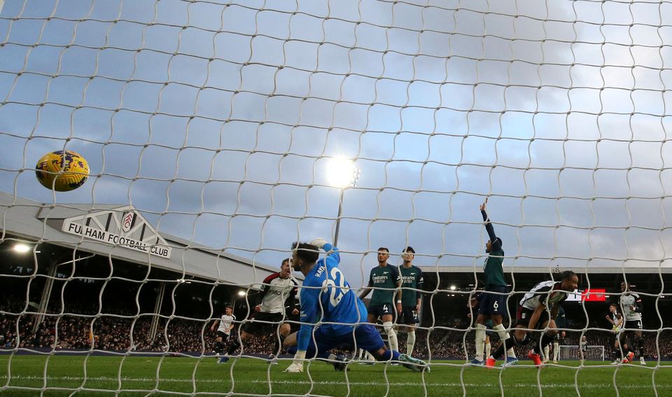 Bobby De Cordova-Reid, foreground right, scores Fulham’s winner against Arsenal last season (Steven Paston/PA)