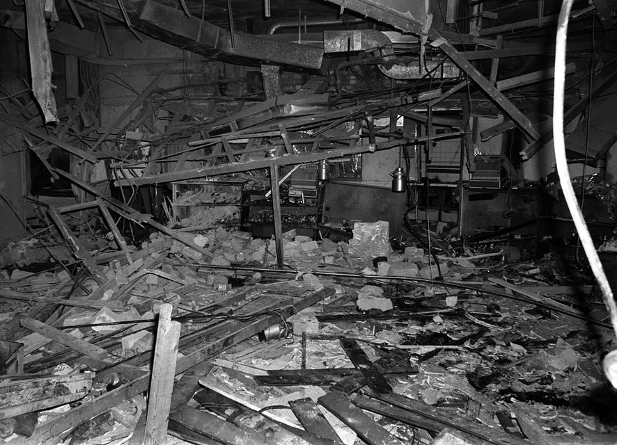 The destroyed remains of the Mulberry Bush pub a day after the attacks (PA)