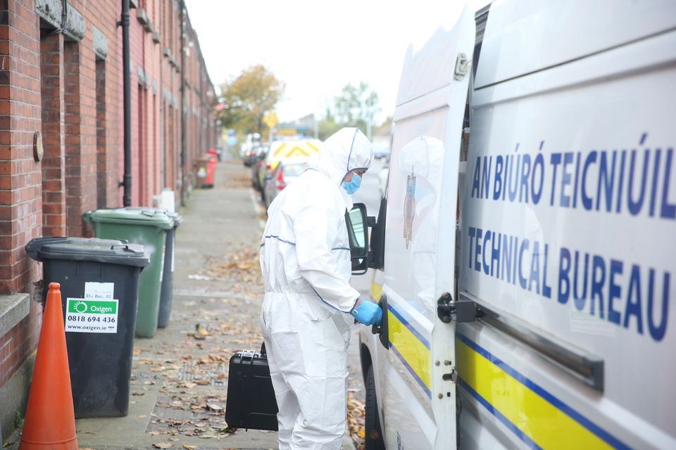  A garda forensic officer at the scene on Emer Terrace, Dundalk, Co Louth