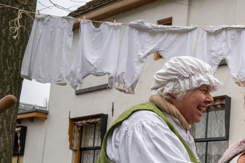 People in costume take part in the Dickens festival (Peter Dejong/AP)