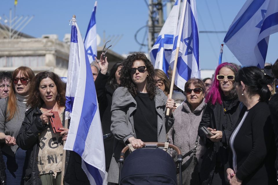 Mourners gathered for the funeral in Rishon Lezion, central Israel (AP)