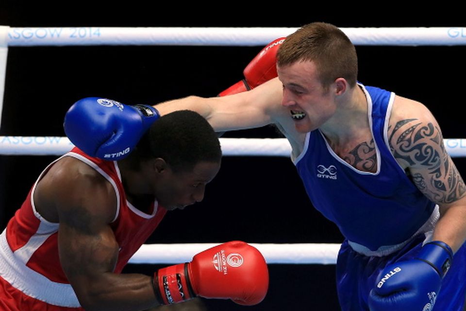 Northern Ireland's Steven Donnelly in action against Canada's Custio Clayton (left) in the Men's Welter Quarter-final at the SECC. Peter Byrne/PA Wire.