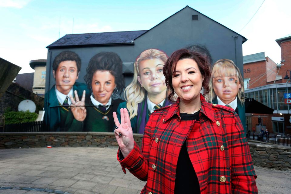 Derry Girls writer Lisa McGee pictured at the Derry Girls mural in Derry