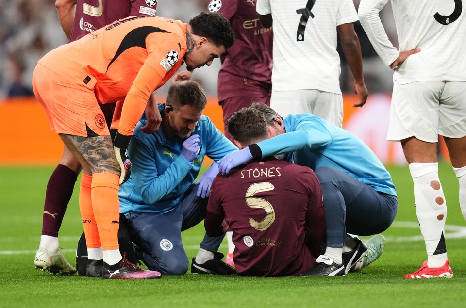 John Stones, pictured receiving treatment at the Bernabeu last week, does not need surgery on his injured thigh (John Walton/PA)