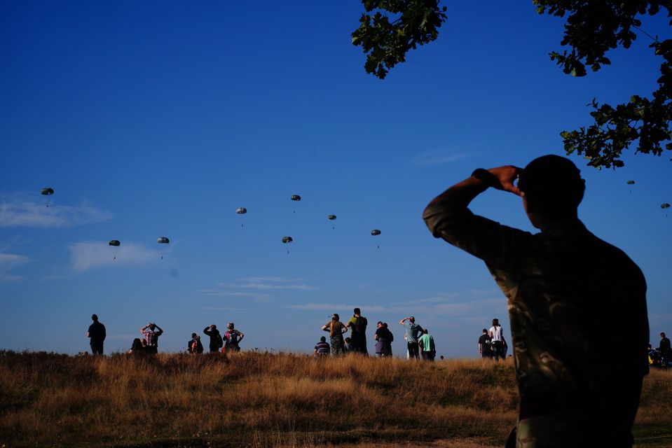 Paratroopers from eight Nato countries parachuted into Ginkel Heath in Ede, Netherlands (Ben Birchall/PA)