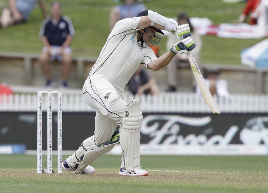 Tom Latham had a half-century to his name at lunch (Mark Baker/AP)