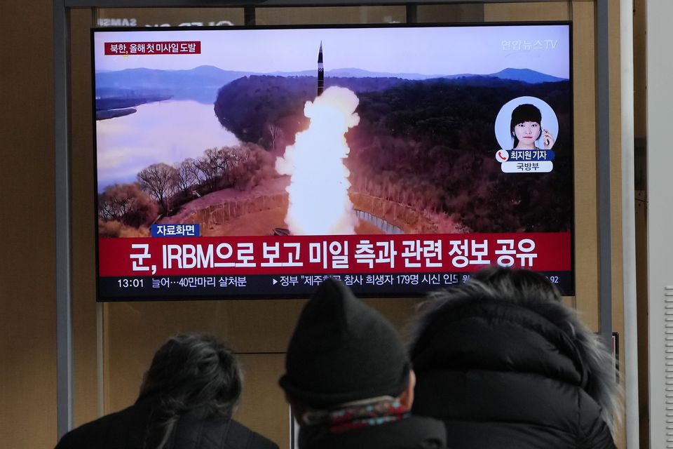 A TV screen shows a file image of North Korea’s missile launch on January 6 (Ahn Young-joon/AP)