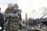 thumbnail: An elderly man is carried by a Self-Defense Force member in the tsunami-torn Natori city, Miyagi Prefecture, northern Japan, Saturday morning, March 12, 2011, one day after strong earthquakes hit the area