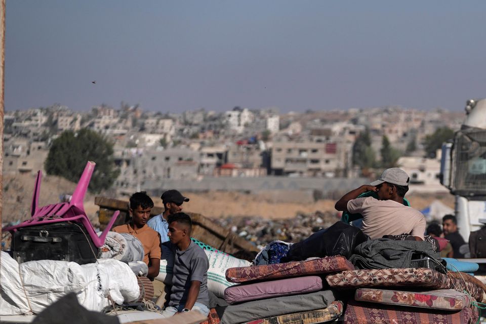 Palestinians flee the Khan Younis area of the Gaza Strip (Abdel Kareem Hana/AP)