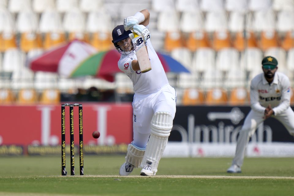 Joe Root plays a shot in Multan (Anjum Naveed/AP)