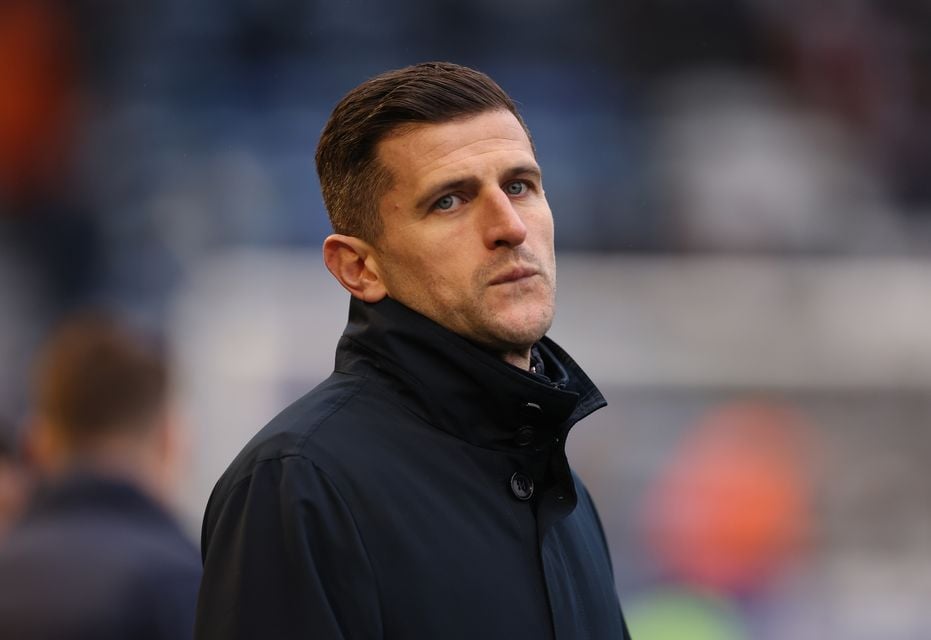 Portsmouth boss John Mousinho will be hoping to move away from Sky Bet Championship relegation danger against Millwall on Tuesday (Steven Paston/PA)