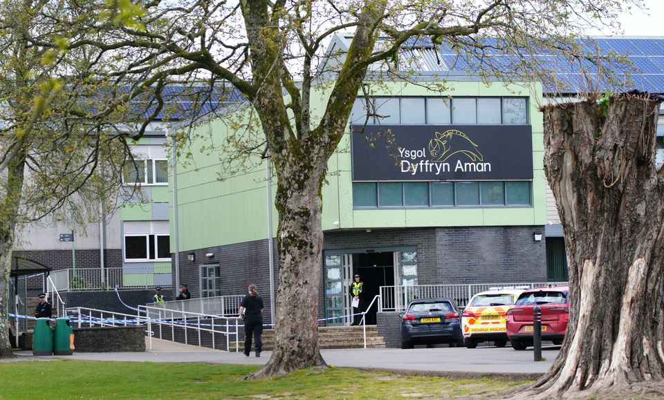 Police at Amman Valley school in Ammanford, Carmarthenshire following the incident (Ben Birchall/PA)