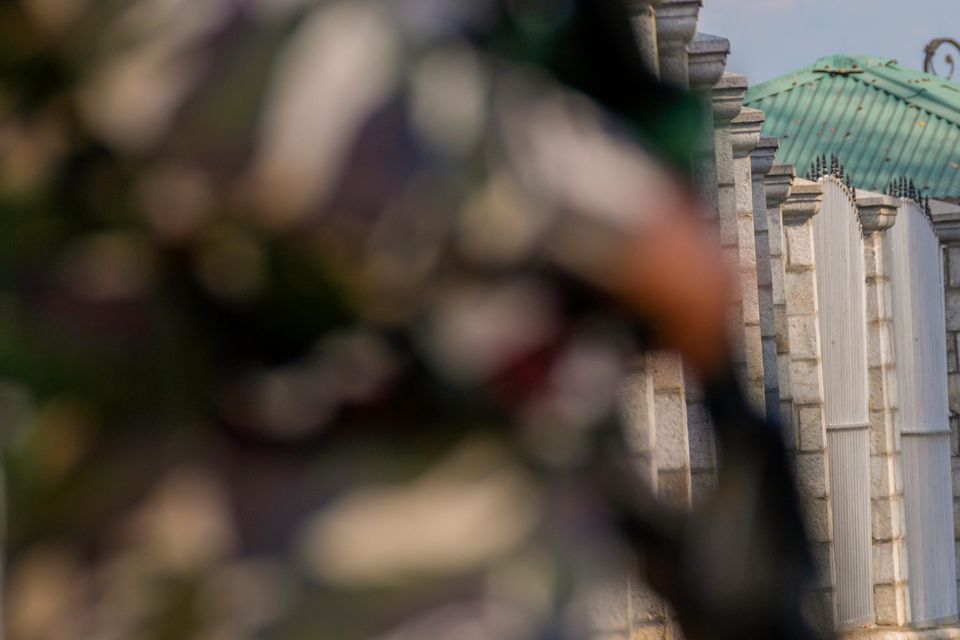 Paramilitary soldiers stand guard outside the venue of swearing in ceremony of ministers of Kashmir’s local government on the outskirts of Srinagar, Indian controlled Kashmir (Dar Yasin/AP)