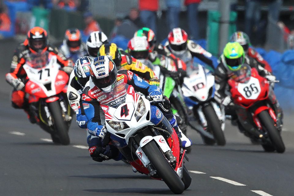 John McGuinness leads the way during a Superbike race at the 2012 North West 200