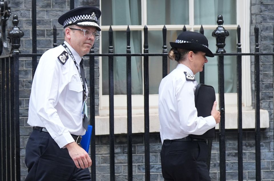 Metropolitan Police Assistant Commissioner Matt Twist (centre) and Deputy Commissioner Lynne Owens leave Number 10 Downing Street, London, after a meeting with Prime Minister Sir Keir Starmer and senior policing leaders following scenes of violent unrest (Yui Mok/PA)