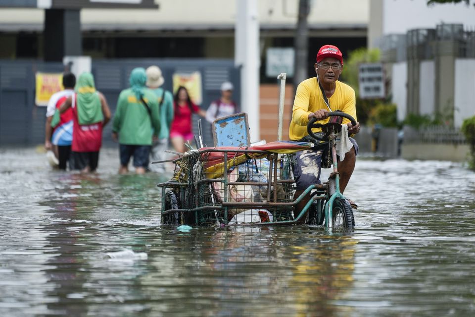 Many people have been left stranded after flooding (AP)