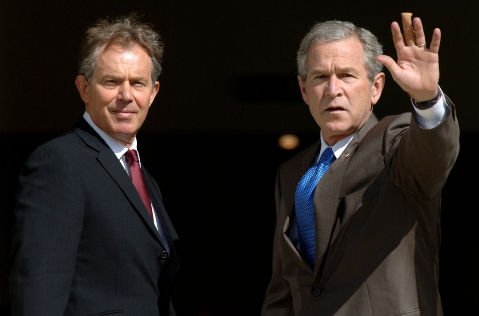 Tony Blair welcomes American President George W Bush to the first meeting of the G8 Summit in 2015 (PA)