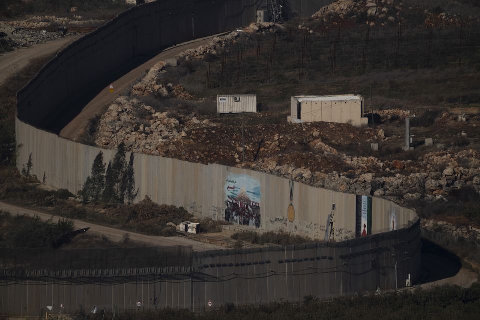 A wall marks the Israeli-Lebanese border (Leo Correa/AP)