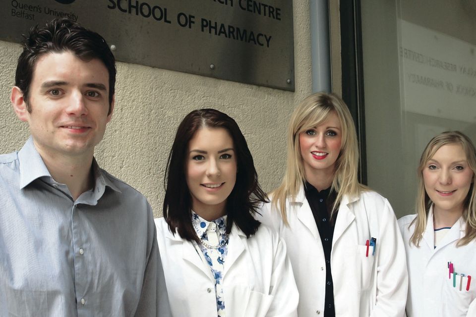 Research team leader Dr Garry Laverty and PhD student Alice McCloskey (right), who was named on the research paper. Included are summer students Sophie Watterson (second left) and Sophie Gilmore