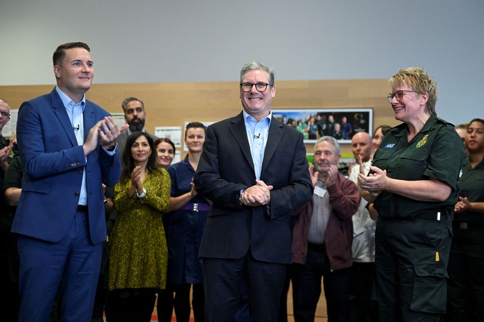 Prime Minister Sir Keir Starmer and Health Secretary Wes Streeting with London Ambulance Service chief paramedic Pauline Cranmer in east London (Jaimi Joy/PA)