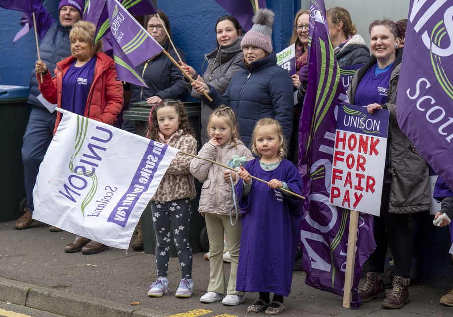 Children were among those joining the picket line (Jane Barlow/PA)